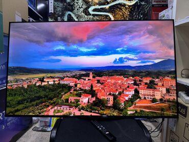 Телевизоры: Телевизор TCL 50V6B, LED, черный Описание Используйте голос для — 27