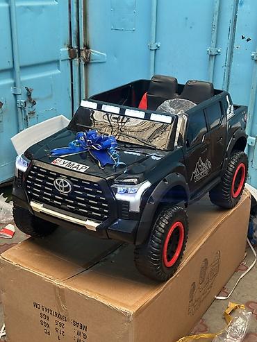 Детский электромобиль-внедорожник (стилизованный под Toyota Tundra) -