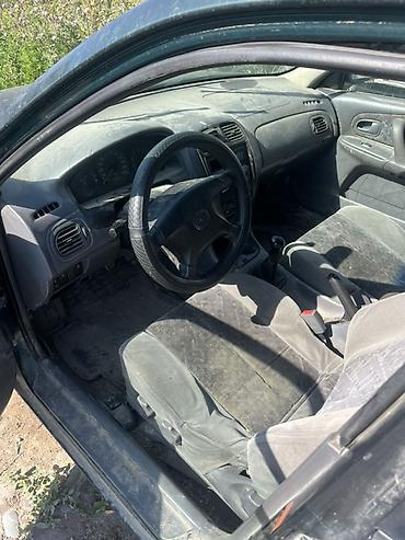 lt 45: Mazda Familia: 1998 г., Механика, Бензин, Универсал — 3