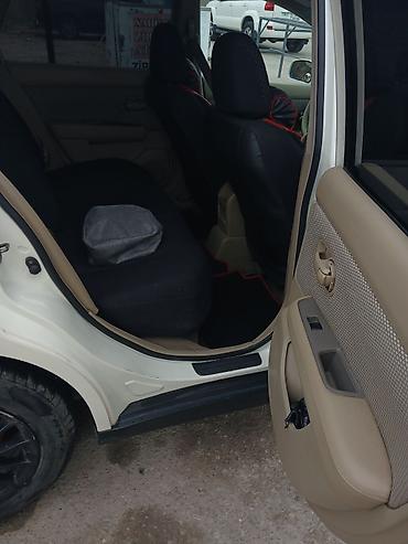 4 ayaq: Nissan Tiida: 1.6 l | 2006 il Sedan — 3