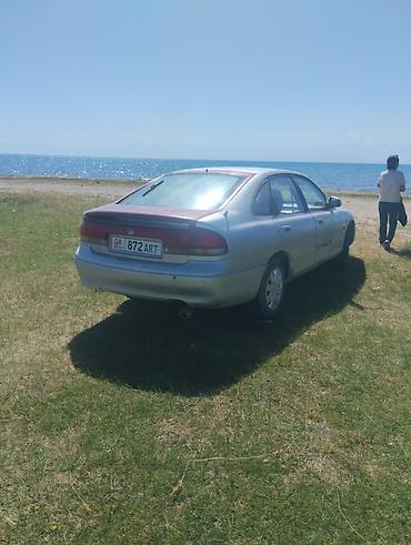 mazda 2000: Mazda Cronos: 1993 г., 1.8 л, Механика, Бензин, Хэтчбэк — 4