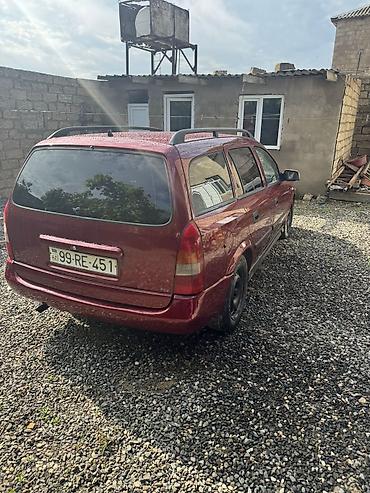 opel astra benzin: Opel Astra Caravan (Universal), qırmızı gövdə yalnız kredetlə — 7