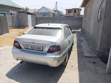 грандеур машина: Автомобиль Daewoo Nexia в серебристом цвете, седан. Модель оснащена