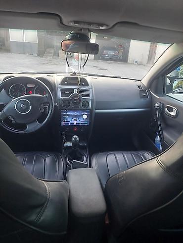 Renault: Renault Megane Grandtour (universal), boz rəng. Əsas xüsusiyyətlər: - — 9