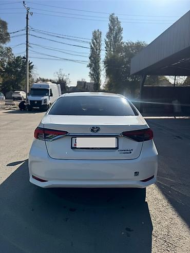 95: Toyota Corolla: 2021 г., 1.8 л, Вариатор, Гибрид, Седан — 4