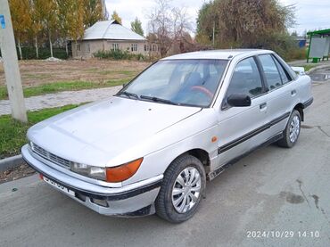 Mitsubishi: Mitsubishi Lancer: 1991 г., 1.3 л, Механика, Бензин, Седан