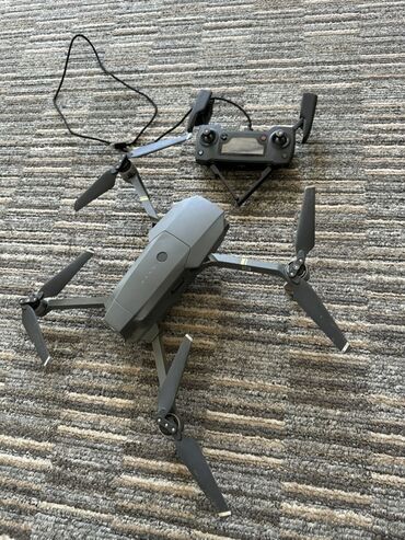 фантом 3: Квадрокоптер DJI Mavic Pro, выполненный в складном корпусе серого