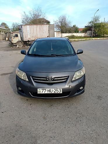 corolla 1.4 dizel: Toyota Corolla sedan - Kuzov: 4 qapılı sedan, tünd boz rəng - — 2