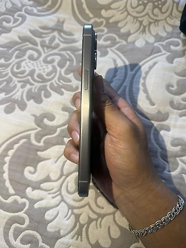 oppo reno 13: IPhone 15 Pro Max, титановый корпус (Natural Titanium). Модель — 2