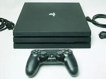second hand shop electronics: U ponudi je Sony PlayStation 4 sa naslova. Konzola je novija FAT — 3