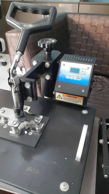 Pres aparatları: Səliqəli istifadə olunub. Fincanlara idman papaqlarına t-shirtlərə — 6