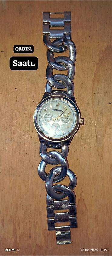 swatch saatlari: Qadın qol saatı – ROMANTIC brendi - Korpus: metal, dairəvi - Rəng — 1
