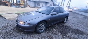авариное: Mazda 2: 1992 г., 2 л, Механика, Бензин, Седан