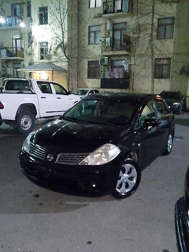 Nissan: Nissan Tiida: 1.6 l | 2007 il Sedan — 3