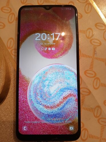 samsung z560: Samsung Galaxy A04e, 32 GB, rəng - Qızılı, Sensor, Barmaq izi, İki sim kartlı