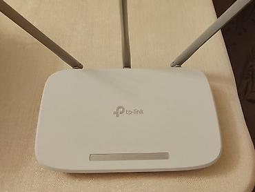 oyun manitoru: TP-Link Wi‑Fi router • Model: TP-Link (üç ədəd xarici antenalı ağ — 4