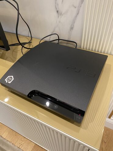 пс 3 слим купить: PS3 Slim satılır. 300GB yaddaşlı modeldir. 6 dənə pult ilə verilir: 4ü