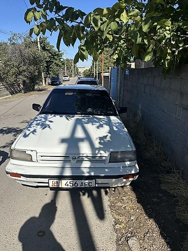 Datsun: Nissan Bluebird: 1990 г., 2 л, Автомат, Бензин, Хэтчбэк — 3