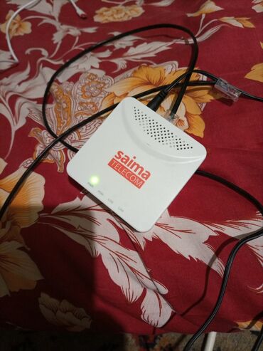 пассивное сетевое оборудование promate: Оптический терминал (ONT) Saima Telecom - Компактный настольный