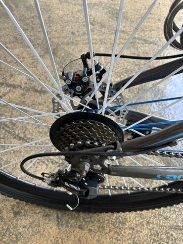 İdman velosipedləri: Ön asqılı, disk əyləcləri və möhkəm çərçivəsi olan dağ velosipedi — 10