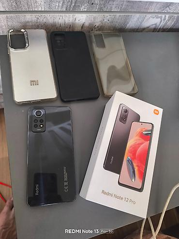 Xiaomi 12 Pro, 256 GB, rəng - Boz,
Barmaq izi, İki sim kartlı, Face ID lalafo.az -da Xiaomi 12 Pro, 256 GB, rəng - Boz,
Barmaq izi, İki sim kartlı, Face ID