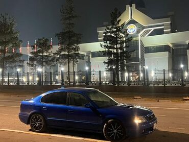 амортизатор субару форестер: Автомобиль Subaru Legacy синего цвета с черными дисками. 30.мин сом