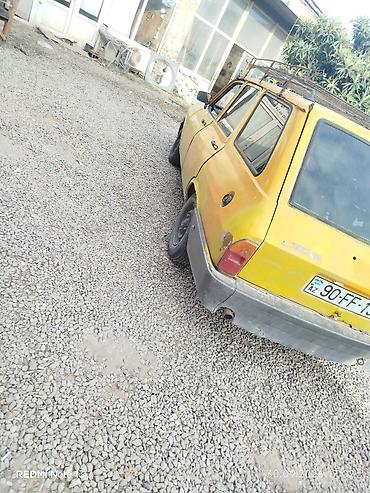 şevralit avtomobil: Renault Toros (universal) – sarı rəngdə Xüsusiyyətlər: - Korpus: 5 — 4