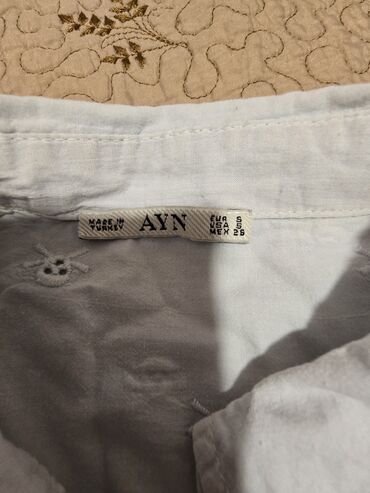 Qadın şalvarları: Bu dəstə müxtəlif üslublu dörd qadın şalvarı və bir qara ətək — 35