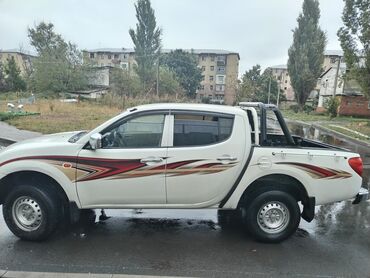 Mitsubishi: Mitsubishi pikap – ikiqat kabinəli, arxa açıq yük bölməsi və — 9