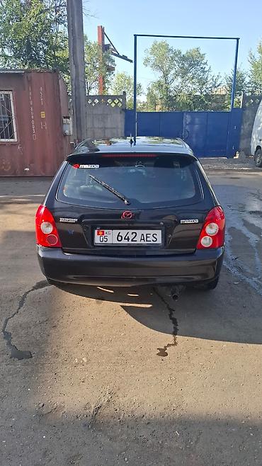 mazda 2000: Mazda 323: 2002 г., 1.6 л, Механика, Бензин, Универсал — 2