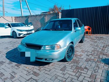 чехол пассат: Daewoo Nexia: 1997 г., 1.5 л, Механика, Газ, Седан