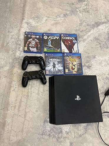 игровой моноблок: PlayStation 4 Pro (черная) + 2 беспроводных контроллера DualShock 4 + — 2