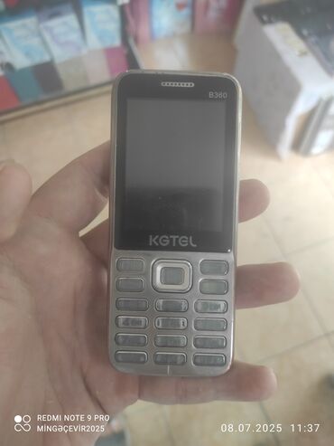 телефон fly bl9205: KGTEL markalı, B380 model, boz rəngli düyməli telefon. Bu telefon həm