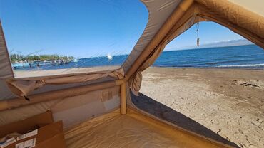 палатка брезент: Сдаю в аренду надувную палатку. легко в эксплуатации. со всем