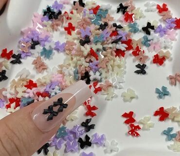 Nega noktiju: Set minijaturnih ukrasnih privesaka za nokte u obliku mašnica — 14