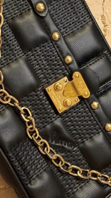 crno zlatne haljine: Louis Vuitton, Materijal: Koža na lalafo.rs crno zlatne haljine: Louis Vuitton, Materijal: Koža
