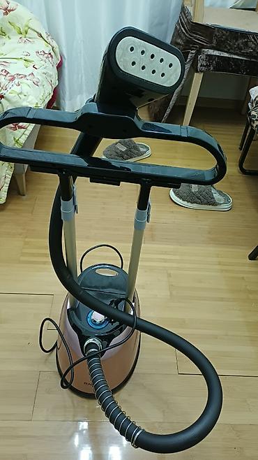 televizor 82 ekran: Geyim buxarlayıcısı (dikey steamer) Xüsusiyyətlər: - Güclü davamlı — 6