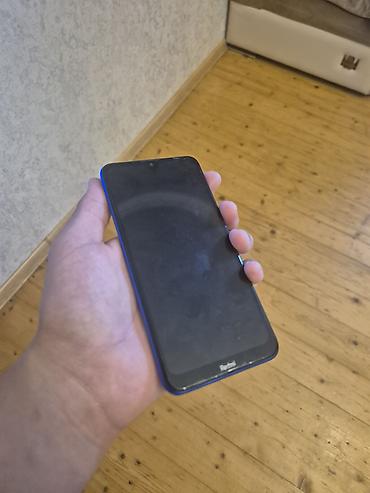 ucuz qiymətə telefon: Xiaomi 32 GB, rəng - Göy, 
 İki sim kartlı — 4