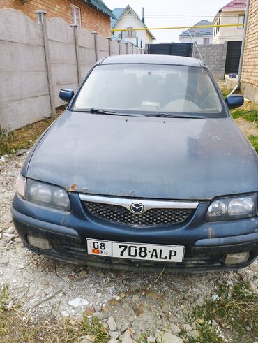 для кузовного ремонта: Mazda 626: 1997 г., 1.8 л, Механика, Бензин, Седан