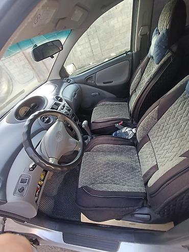 skoda rapid 2012: Toyota Echo: 2001 г., 1.5 л, Автомат, Бензин, Седан — 8