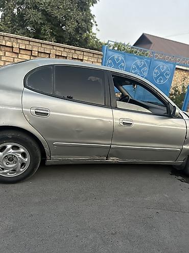 Daewoo Leganza: 1999 г., 2 л, Механика, Бензин, Седан — 7