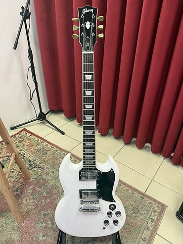 Электрогитара Gibson SG - Классический двойной вырез корпуса SG с