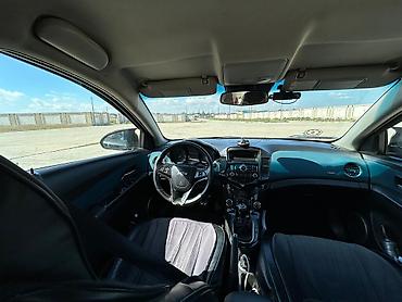 kia rio 2007: Chevrolet Cruze: 1.6 l | 2010 il 197965 km Sedan — 7