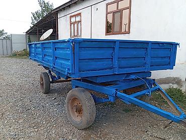 en ucuz traktörler: Traktor qoşqusu – 2 oxlu, mavi rəngdə metal bortlu. - Ümumi təyinatlı — 2