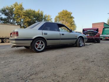 запчасти на мазда переходка: Mazda 626: 1989 г., 2 л, Механика, Газ, Седан