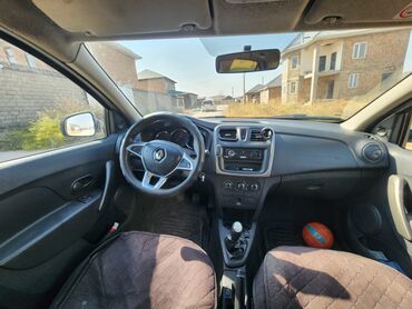 рено канго: Renault Logan, белый седан. Основные особенности: - Кузов: 4‑дверный
