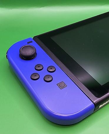 Nintendo Switch: Игровая консоль Nintendo Switch с разноцветными Joy‑Con (левый — — 6