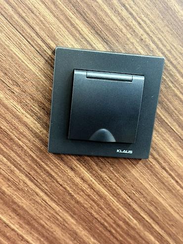 Выключатели: Настенные выключатели KLAUS, графитовый матовый цвет. Описание: - — 14