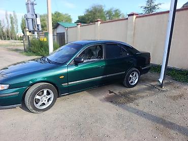 385 55: Mazda 626: 1999 г., 1.8 л, Механика, Бензин, Седан — 5