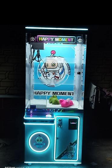 Игровой автомат «Happy Moment» — кран-мани́пулятор (claw machine)
